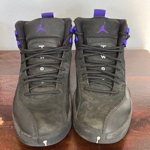 Air Jordan’s black an purple basketball shoes. Jump man edition.